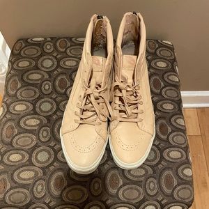 High top leather Vans.